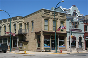 103 N MAIN ST, a Commercial Vernacular small retail building, built in Lake Mills, Wisconsin in 1854.