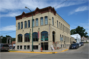 203 W LAKE ST, a Italianate large retail building, built in Lake Mills, Wisconsin in 1892.