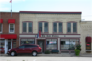 118 S MAIN ST, a Commercial Vernacular industrial building, built in Lake Mills, Wisconsin in 1900.