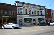 122-128 E LAKE ST, a Queen Anne bank/financial institution, built in Lake Mills, Wisconsin in 1893.