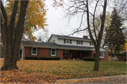 631 SUNSET CIRCLE, a Colonial Revival/Georgian Revival house, built in Allouez, Wisconsin in 1963.