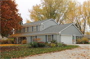 636 SUNSET CIRCLE, a Colonial Revival/Georgian Revival house, built in Allouez, Wisconsin in 1966.