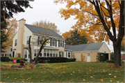 655 SUNSET CIRCLE, a Colonial Revival/Georgian Revival house, built in Allouez, Wisconsin in 1943.