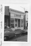 121 W MAIN ST, a Commercial Vernacular grocery store/supermarket, built in Cambridge, Wisconsin in 1900.