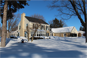 655 SUNSET CIRCLE, a Colonial Revival/Georgian Revival house, built in Allouez, Wisconsin in 1943.