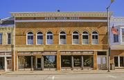219 W MAPLE ST, a Romanesque Revival theater/opera house/concert hall, built in Lancaster, Wisconsin in 1894.