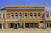 219 W MAPLE ST, a Romanesque Revival opera house/concert hall, built in Lancaster, Wisconsin in 1894.