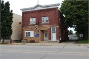 142 MAIN ST, a Commercial Vernacular small retail building, built in Campbellsport, Wisconsin in 1915.