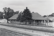 SW CNR OF MILWAUKEE AVE AND 11TH ST, a Romanesque Revival depot, built in South Milwaukee, Wisconsin in 1893.