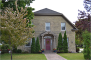 2157 RIVERSIDE AVE, a Dutch Colonial Revival small office building, built in Marinette, Wisconsin in 1888.