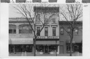 414 STATE ST, a Commercial Vernacular small retail building, built in Madison, Wisconsin in 1855.