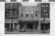 409 STATE ST, a Commercial Vernacular retail building, built in Madison, Wisconsin in 1887.