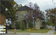 2157 RIVERSIDE AVE, a Dutch Colonial Revival small office building, built in Marinette, Wisconsin in 1888.