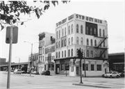 300 W JUNEAU AVE, a Commercial Vernacular retail building, built in Milwaukee, Wisconsin in 1876.