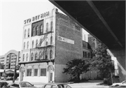 300 W JUNEAU AVE, a Commercial Vernacular large retail building, built in Milwaukee, Wisconsin in 1876.