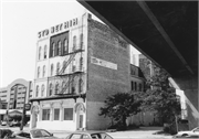 300 W JUNEAU AVE, a Commercial Vernacular retail building, built in Milwaukee, Wisconsin in 1876.