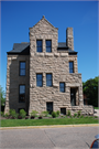 320 S BROADWAY, a Romanesque Revival house, built in Menomonie, Wisconsin in 1889.