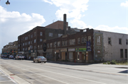 817-831 N 27TH ST, a Spanish/Mediterranean Styles large retail building, built in Milwaukee, Wisconsin in 1926.