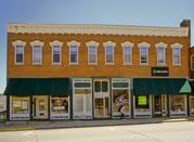 125-129 N MADISON ST, a Italianate large retail building, built in Lancaster, Wisconsin in 1896.