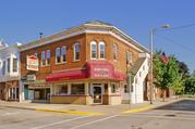 201 W MAPLE ST, a Commercial Vernacular large retail building, built in Lancaster, Wisconsin in 1883.