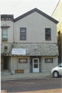 15 E MAIN ST, a Greek Revival small retail building, built in Evansville, Wisconsin in .