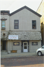 15 E MAIN ST, a Greek Revival retail building, built in Evansville, Wisconsin in .