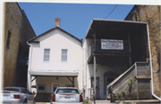 15 E MAIN ST, a Greek Revival small retail building, built in Evansville, Wisconsin in .
