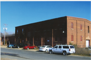 230 MONROE ST N, a Astylistic Utilitarian Building roundhouse/repair shop/car barn, built in North Hudson, Wisconsin in 1890.