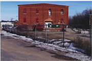 230 MONROE ST N, a Astylistic Utilitarian Building roundhouse/repair shop/car barn, built in North Hudson, Wisconsin in 1890.