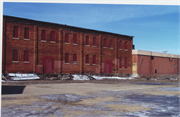 230 MONROE ST N, a Astylistic Utilitarian Building roundhouse/repair shop/car barn, built in North Hudson, Wisconsin in 1890.