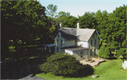 9022 W COUNTY LINE RD, a Cross Gabled house, built in Mequon, Wisconsin in 1899.