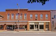 125 W MAPLE ST, a Italianate retail building, built in Lancaster, Wisconsin in 1888.