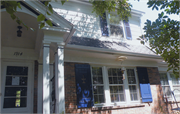 1914 ROWLEY AVE, a Dutch Colonial Revival house, built in Madison, Wisconsin in 1924.