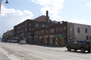 817-831 N 27TH ST, a Spanish/Mediterranean Styles retail building, built in Milwaukee, Wisconsin in 1926.