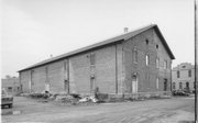 100 S 7TH ST (AKA 515 E MAIN ST), a Italianate warehouse, built in Stoughton, Wisconsin in 1885.