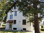 220 UNION ST, a Arts and Crafts house, built in Hartford, Wisconsin in 1915.