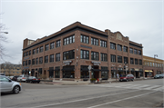 2551-2565 N DOWNER AVE, a Twentieth Century Commercial automobile showroom, built in Milwaukee, Wisconsin in 1916.