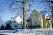 1024 OAKLAND AVE, a Dutch Colonial Revival house, built in Janesville, Wisconsin in 1920.