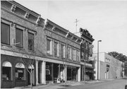 120-128 S PINCKNEY ST, a Italianate retail building, built in Madison, Wisconsin in 1856.