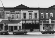 161 E MAIN ST, a Commercial Vernacular retail building, built in Stoughton, Wisconsin in 1889.