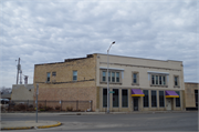 3025-3027 WASHINGTON AVE, a Commercial Vernacular large retail building, built in Racine, Wisconsin in 1920.