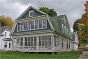 349 WASHINGTON ST 349 WASHINGTON ST, a Dutch Colonial Revival house, built in Wrightstown, Wisconsin in 1920.