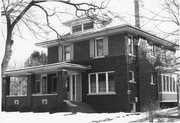 125 S MONROE ST, a American Foursquare house, built in Stoughton, Wisconsin in 1915.