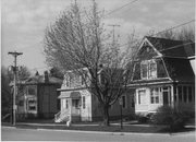 308 S MONROE ST, a Dutch Colonial Revival house, built in Stoughton, Wisconsin in 1910.