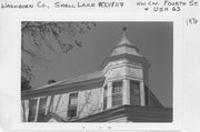 NW CNR OF 4TH AVE AND US HIGHWAY 63 NW CNR OF 4TH AVE AND US HIGHWAY 63, a Queen Anne house, built in Shell Lake, Wisconsin in 1890.