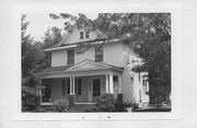 122 SUMMIT ST, a American Foursquare house, built in Spooner, Wisconsin in 1902.