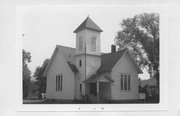 E SIDE OF SCRIBER ST AT CNR W/ PINE ST, a Cross Gabled church, built in Spooner, Wisconsin in 1918.