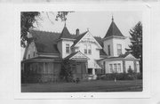 513 DALE ST, a Queen Anne house, built in Spooner, Wisconsin in 1904.