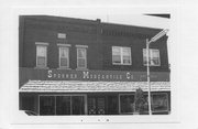 CA 105 WALNUT ST, a Commercial Vernacular retail building, built in Spooner, Wisconsin in 1915.