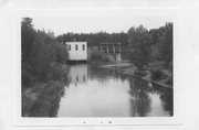 NEXT TO DAM ACROSS TOTAGATIC RIVER AT S END OF MINONG FLOWAGE, SEE FROM COUNTY HIGHWAY I, a Astylistic Utilitarian Building public utility/power plant/sewage/water, built in Minong, Wisconsin in .